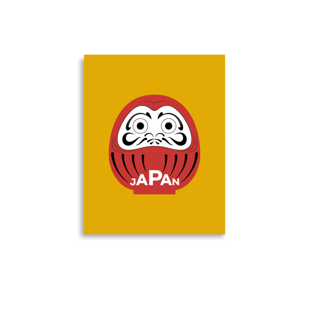 Japan-Daruma Lucky Charm poster in yellow and red by Aymar Quiris Studio, Japanese themed wall art for wealth and prosperity, available in multiple sizes.