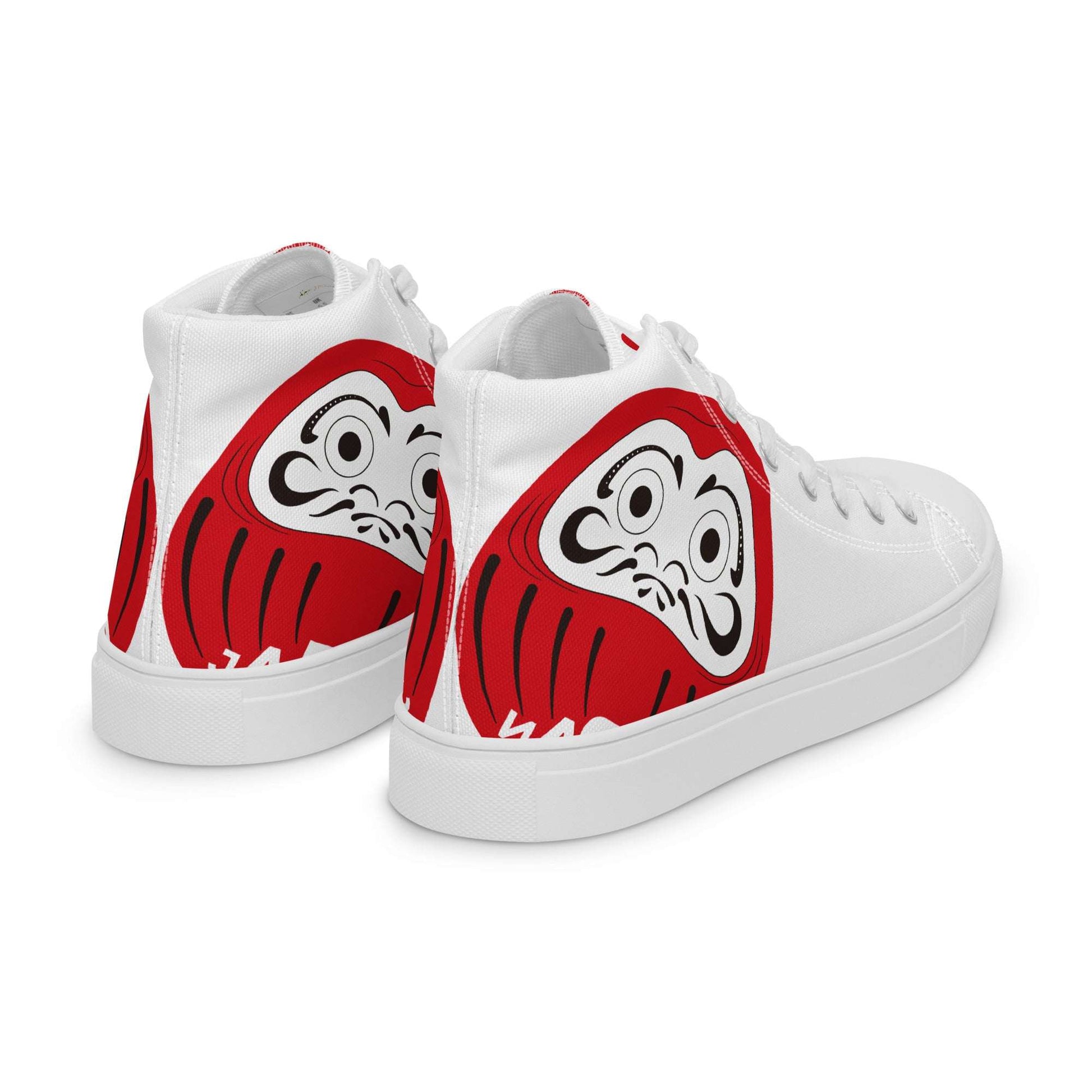 Close-up of the red Daruma mask print on white canvas shoes, high-definition artistic detail of Aymar Quiris Studio Japan-Daruma Lucky Steps collection.